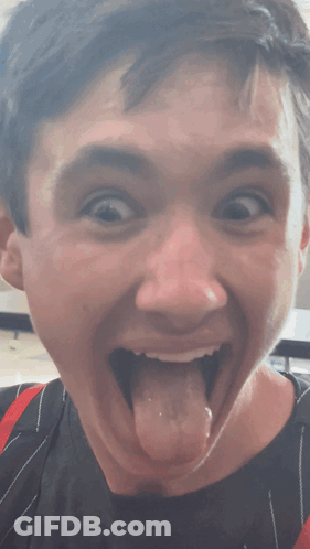 Young Man With Mouth Open And Tongue Out GIF