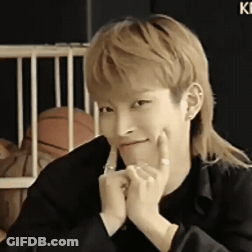Young Man With Mullet Making Face GIF
