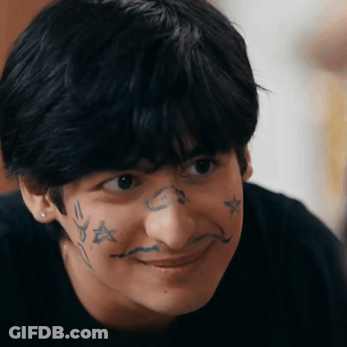 Young Man With Mustache And Star Face GIF