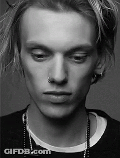 Young Man With Nose Ring Earrings And Necklace GIF