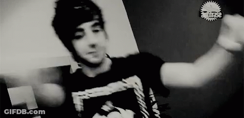 Young Man With Outstretched Arms GIF