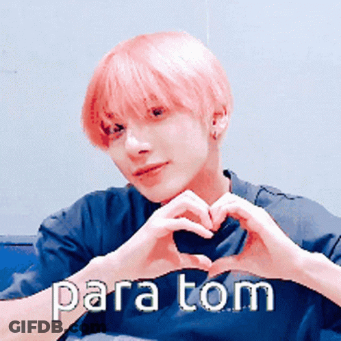 Young Man With Pink Hair Making Heart Shape Saying Para Tom GIF