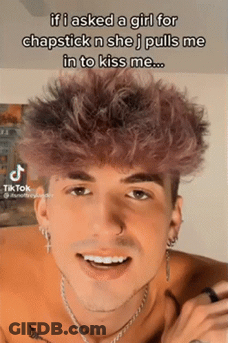 Young Man With Purple Hair Has TikTok Post On Face GIF