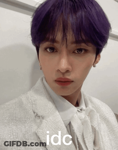 Young Man With Purple Hair In White Suit And Tie GIF