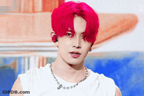 Young Man With Red Hair And Necklace GIF