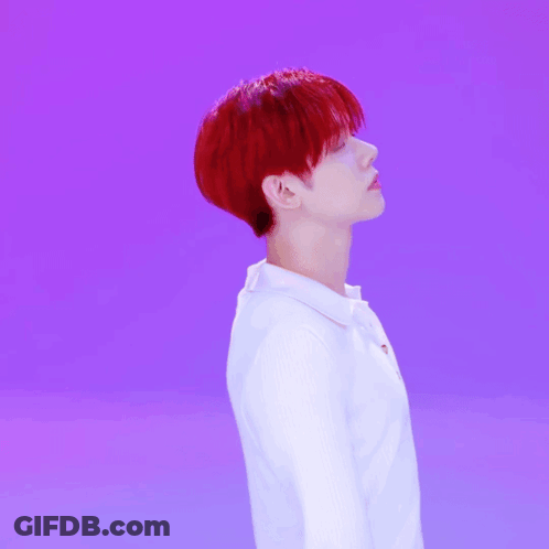 Young Man With Red Hair And White Shirt GIF