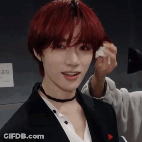 Young Man With Red Hair Being Blow Dried GIF