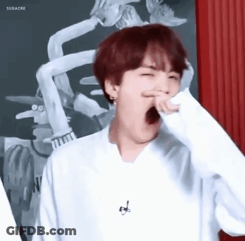Young Man With Red Hair Yawning GIF