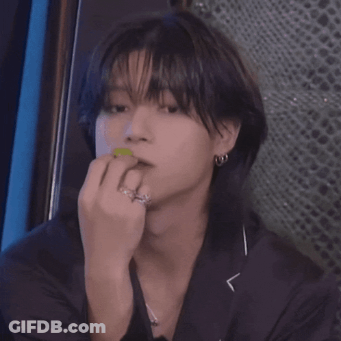 Young Man With Ring Eating Green Apple GIF