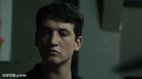 Young Man With Serious Expression GIF