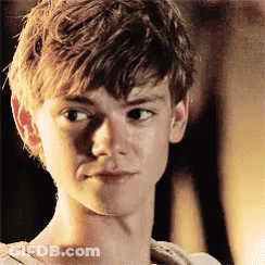Young Man With Serious Expression Close Up GIF