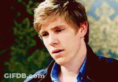 Young Man With Serious Expression GIF