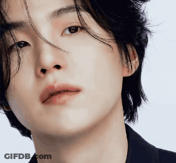 Young Man With Serious Face GIF