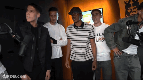 Young Men At Microphones Wearing It La Riot Shirt GIF