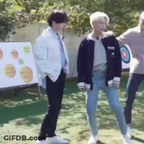 Young Men By Target In Field GIF