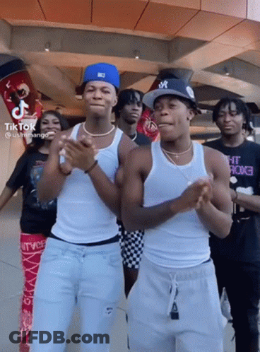 Young Men Clapping With NY Hat GIF