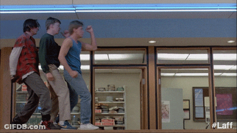 Young Men Dancing In Front Of Pizza Hut Sign GIF