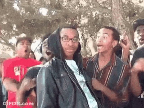 Young Men Dancing In Park One In Hooded Jacket GIF