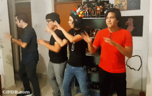 Young Men Dancing In Room With Lego Shelf GIF