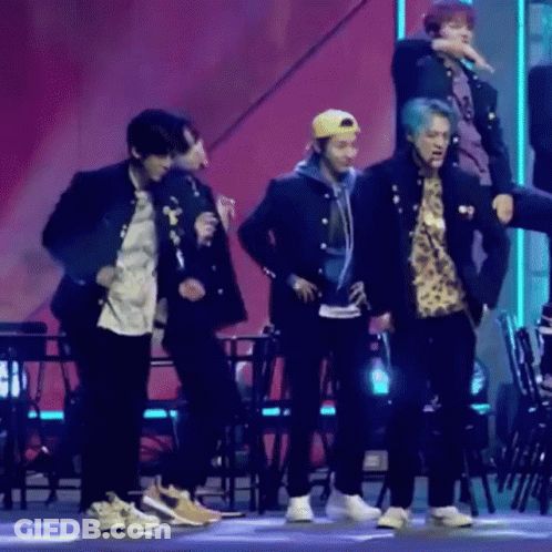Young Men Dancing On Stage GIF