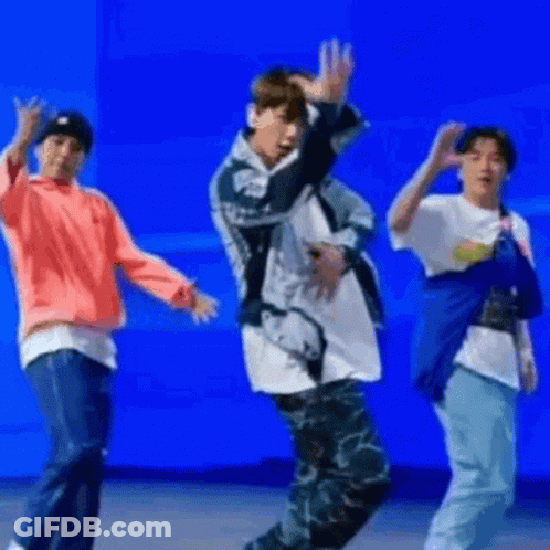 Young Men Dancing On Stage GIF