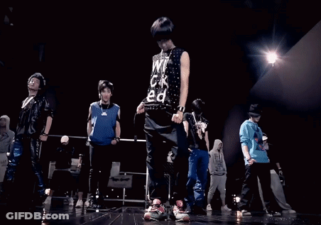 Young Men Dancing On Stage With 14 Shirt GIF