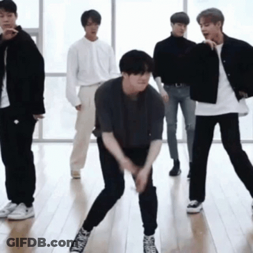 Young Men Dancing On Wooden Floor GIF
