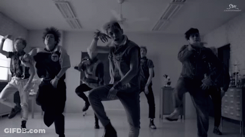 Young Men Dancing Under SM Entertainment Ceiling GIF