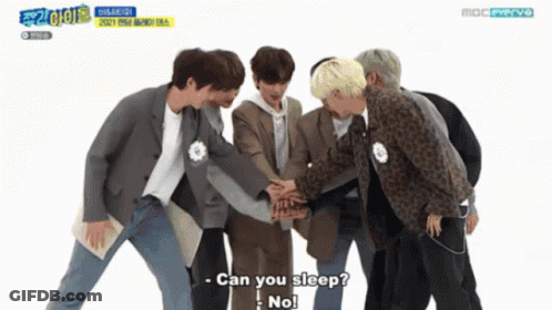 Young Men Huddled Asking To Sleep GIF