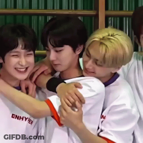 Young Men Hugging In White Shirts GIF