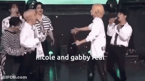 Young Men Hugging On Stage GIF