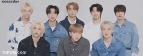 Young Men In Denim Jackets Posing GIF