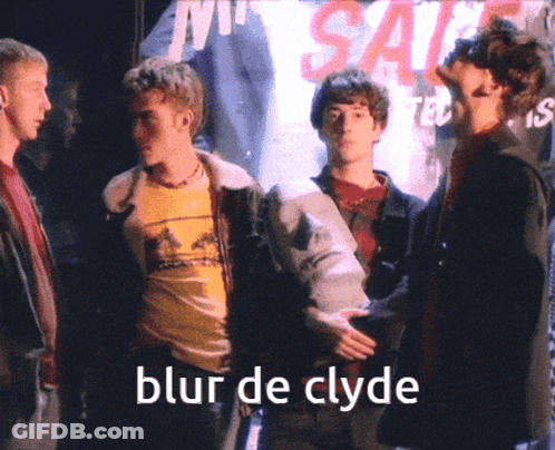 Young Men In Front Of Sale Sign GIF