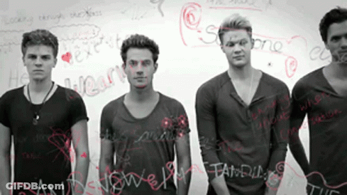 Young Men In Front Of Whiteboard Saying He Heart GIF