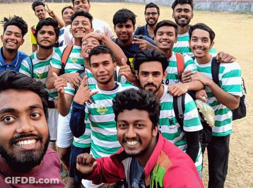 Young Men In Green And White Striped Shirts Taking Selfie GIF