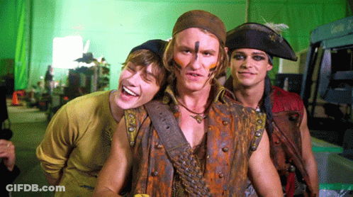 Young Men In Pirate Costumes Posing GIF