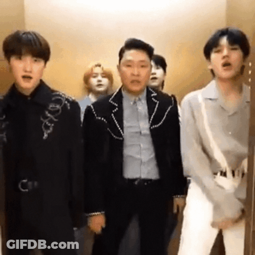 Young Men Making Funny Faces In Elevator GIF