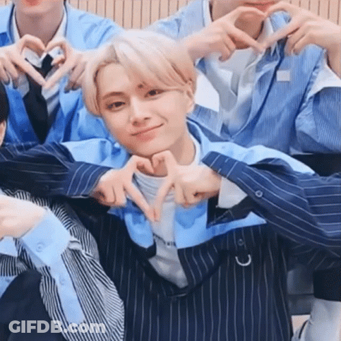 Young Men Making Heart Shape With Fingers GIF