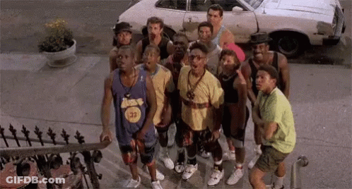 Young Men On Sidewalk By White Car GIF