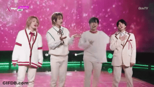Young Men On Stage With Hands In Air GIF