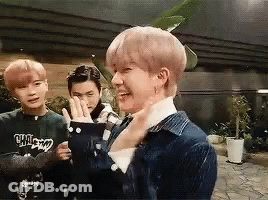 Young Men, One Wearing Chicago Shirt GIF