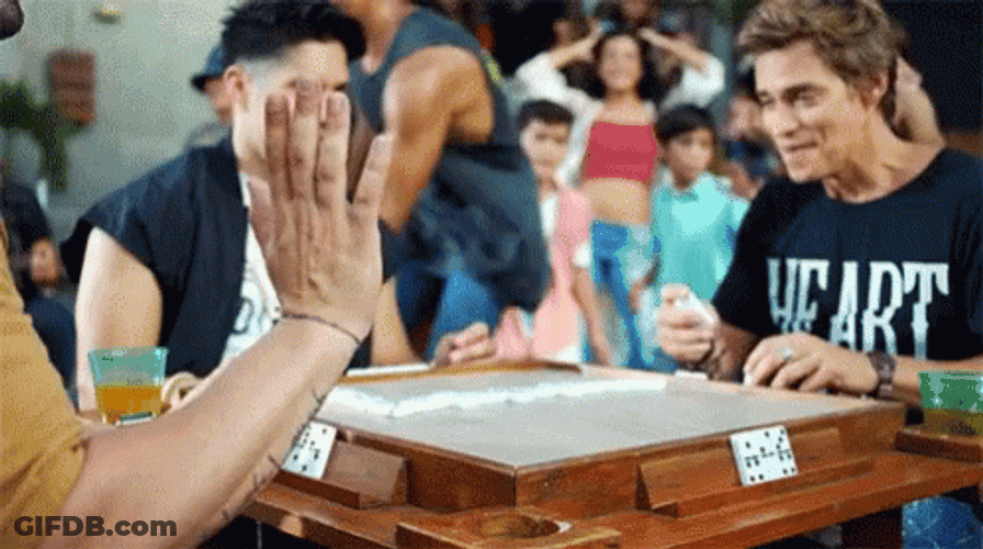 Young Men Playing Domino Game GIF
