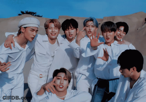 Young Men Posing One In Beret GIF
