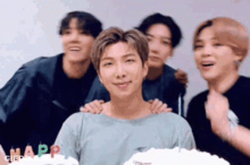 Young Men Posing With Cake Saying Happ GIF