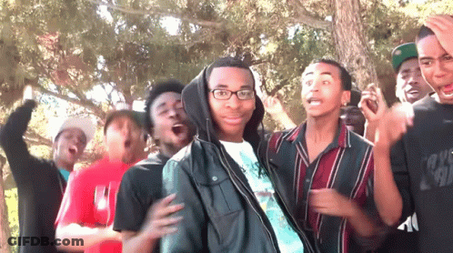 Young Men Posing With N Shirt GIF