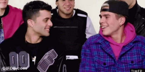 Young Men Posing With Number 100 GIF