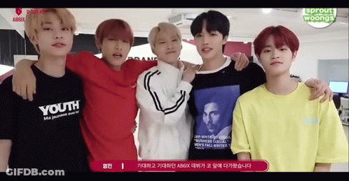 Young Men Posing With Youth Shirt GIF