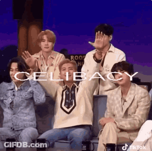 Young Men Raising Hands Celibacy Text GIF