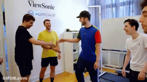 Young Men Shaking Hands In Front Of ViewSonic Wall GIF