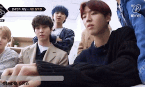 Young Men Sitting Around Table One Playing Keyboard GIF